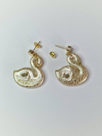 Boucles dorées cygnes